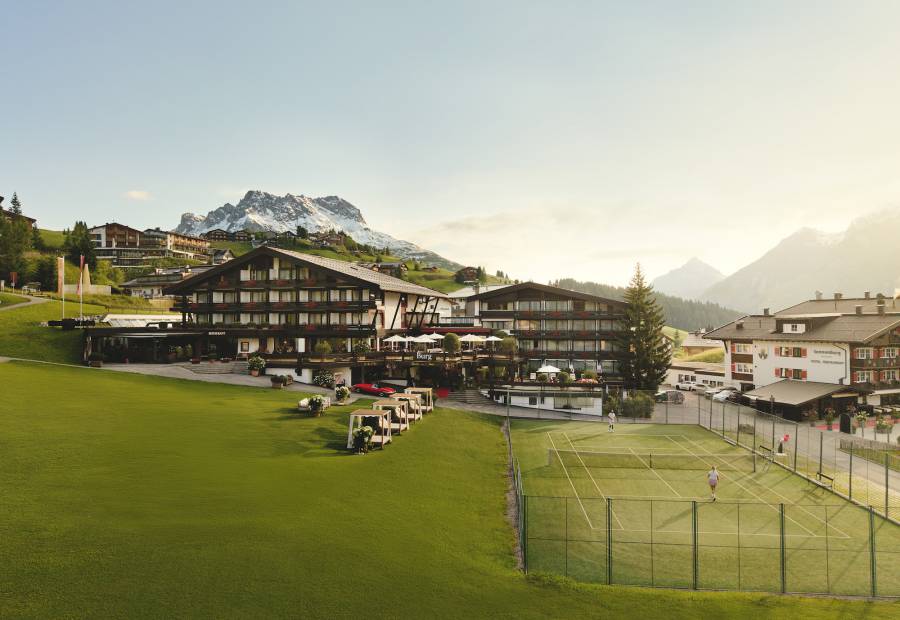 View of the Burg Hotel in Lech am Arlberg in summer