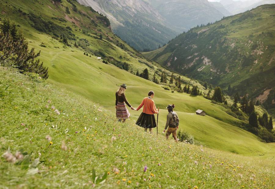 Hiking on the mountain meadow in Lech am Arlberg